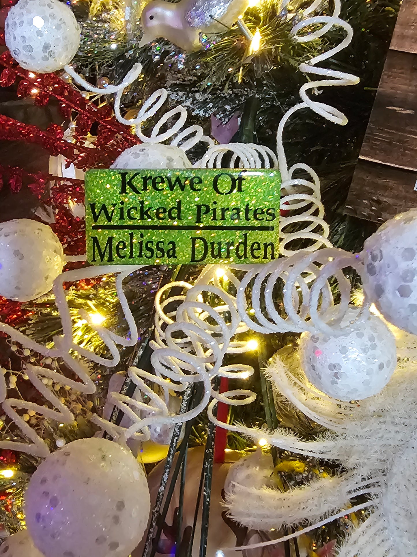 Krewe Name Bagde- If you plan to pickup your item, use NWFLKREWE for the discount code at checkout.